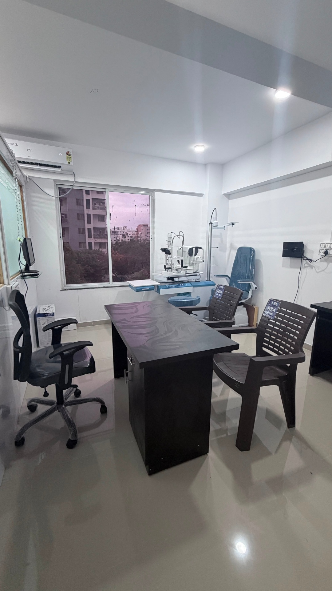 ClearView Eye Clinic examination room with slit lamp — Wagholi Pune